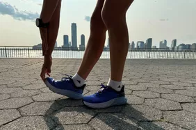 Woman wearing Hoka Arahi Sneakers 