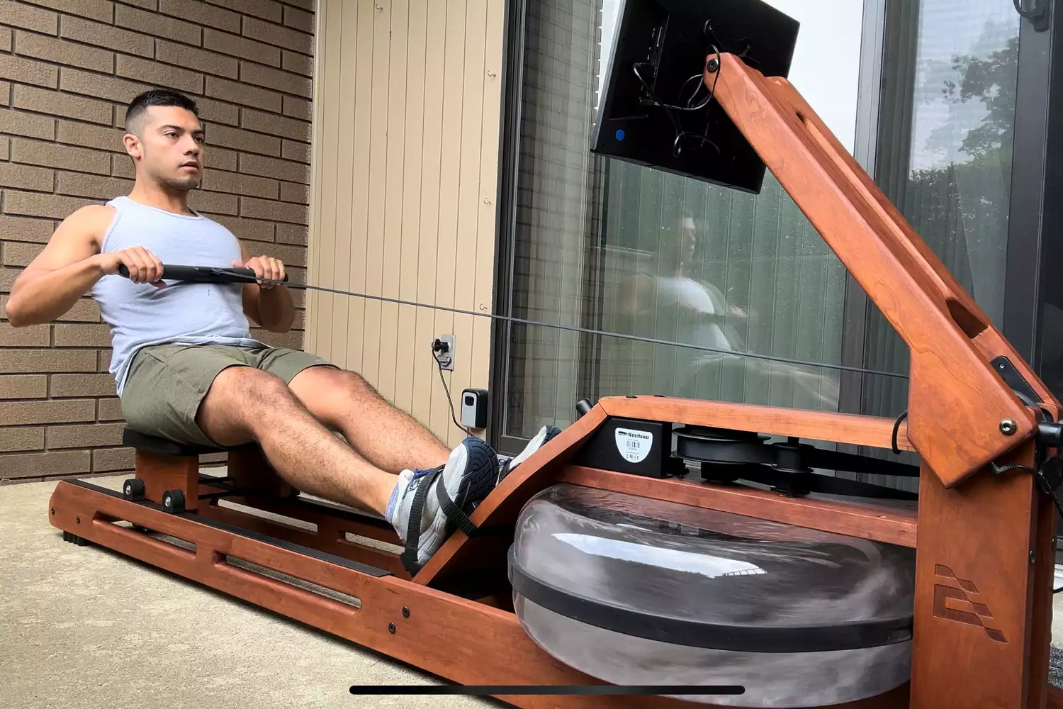 A person uses the Ergatta Rower 