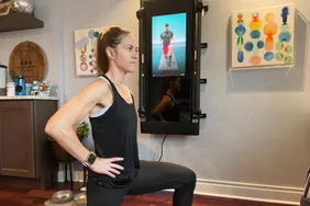 Person working out using the Tonal fitness mirror
