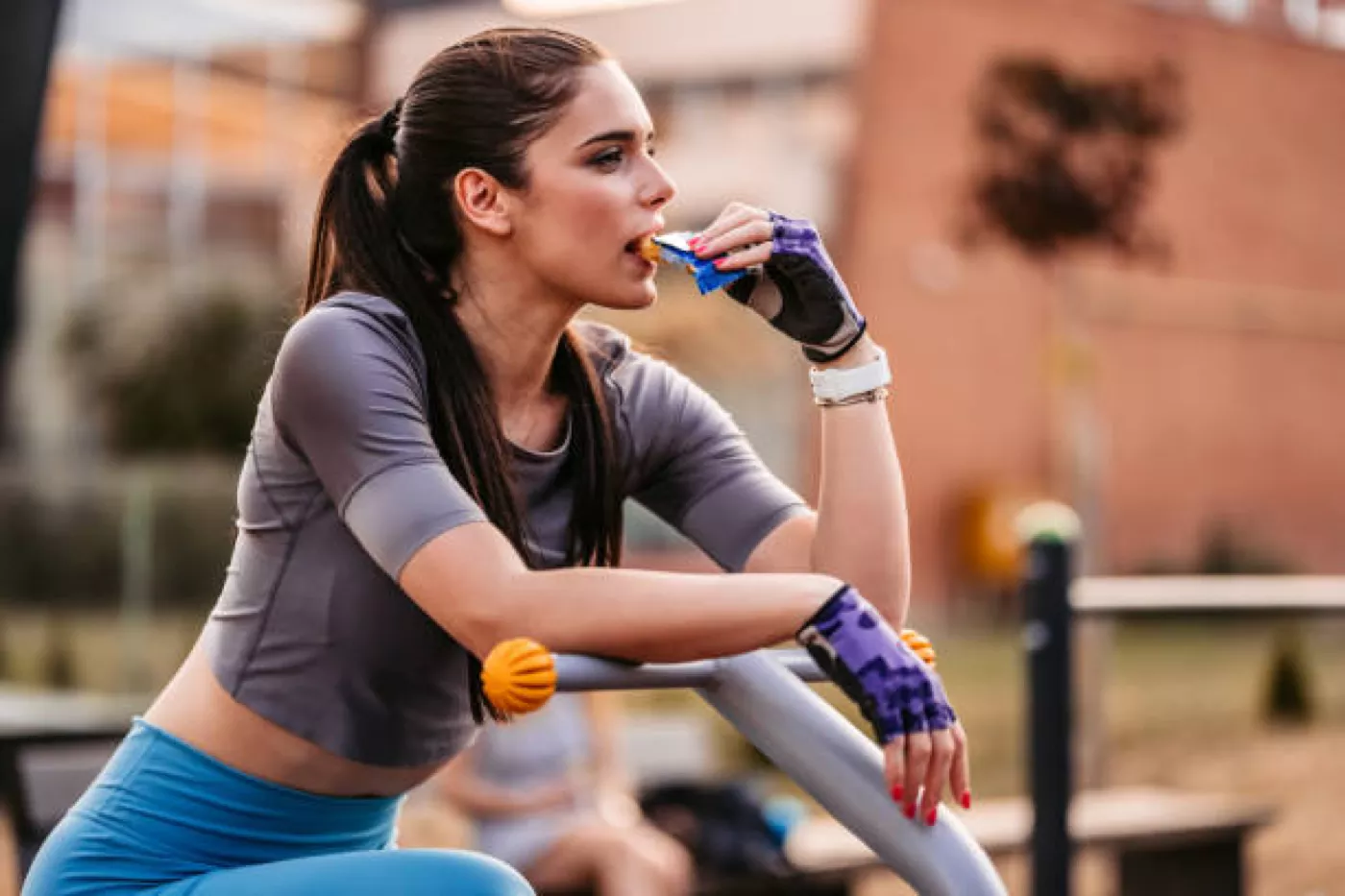 Woman eating protein bar