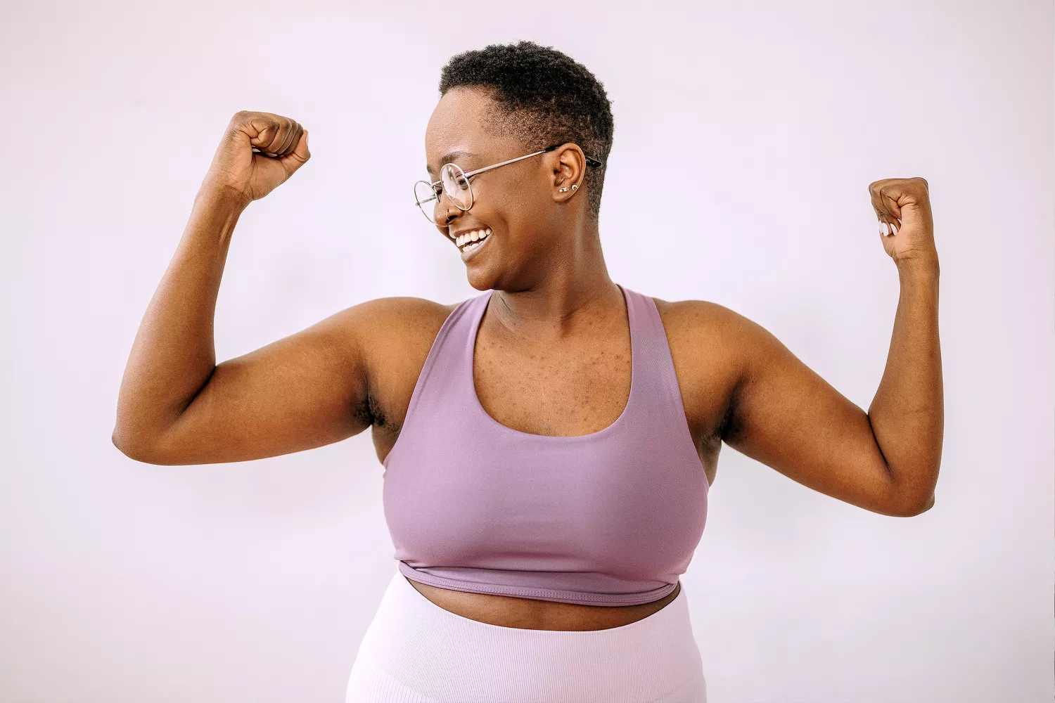 Woman Flexing Her Arms