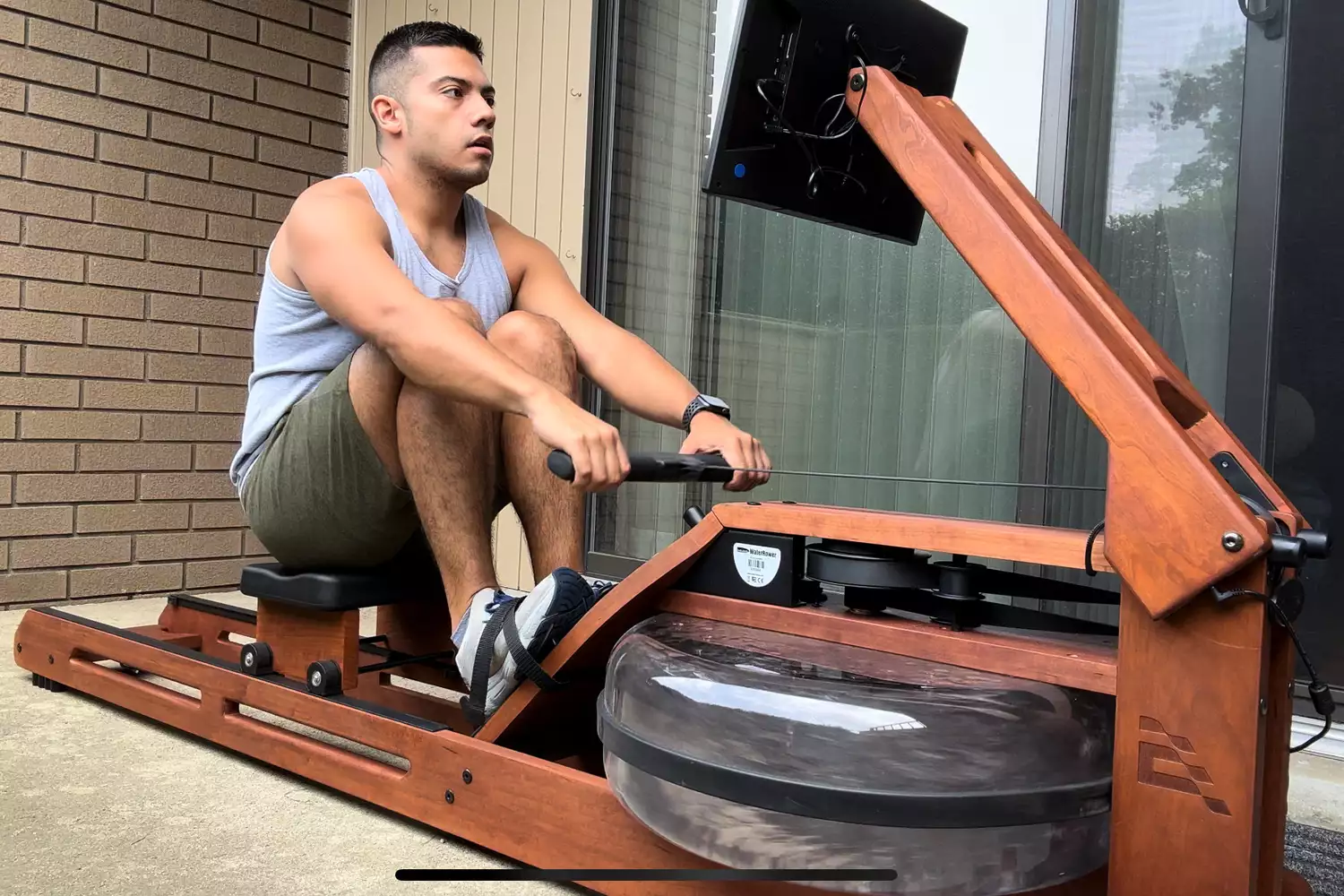 A person uses the Ergatta Rower 