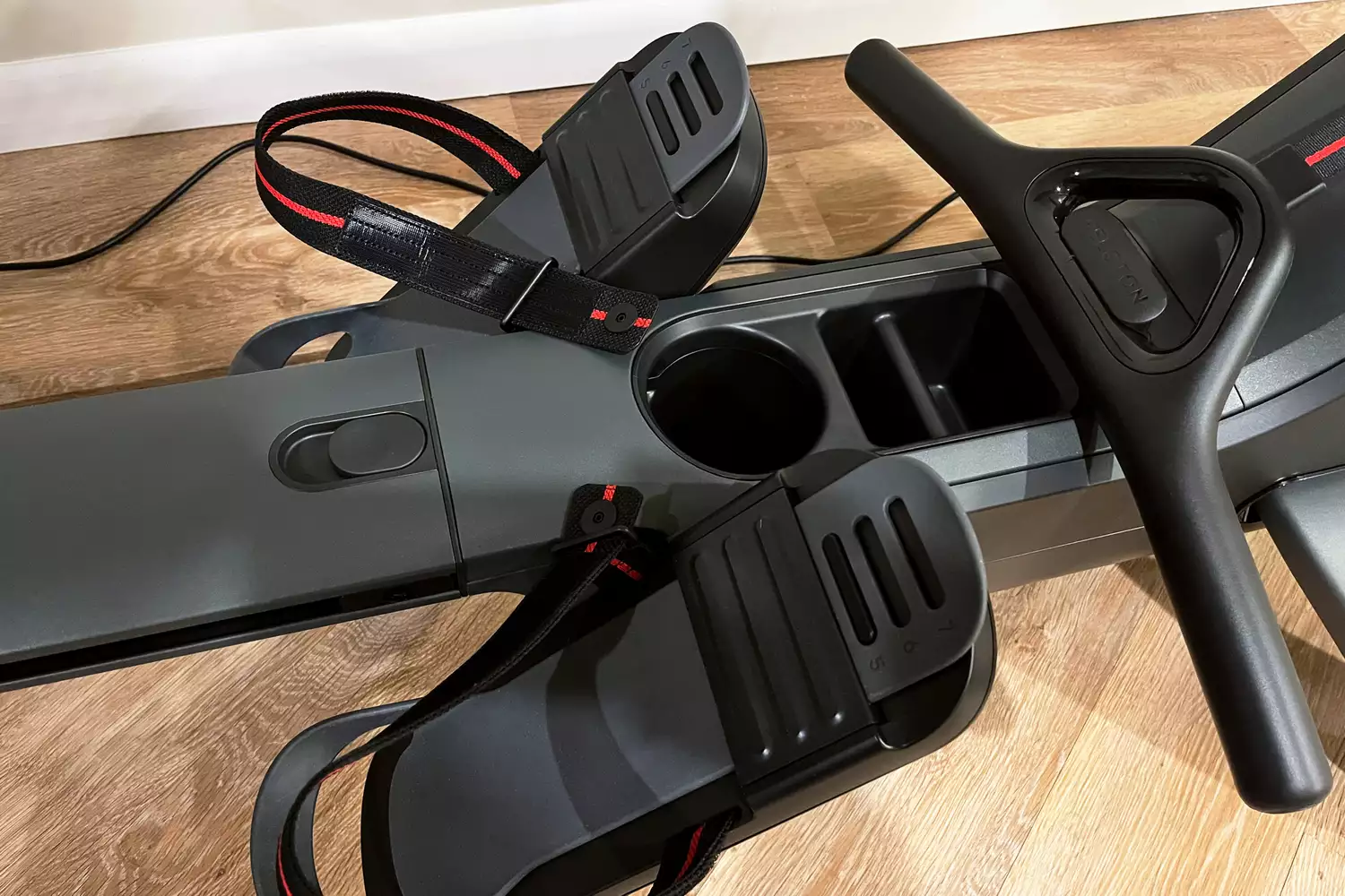 Closeup of the pedals and the handles on the Peloton Row