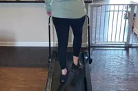 Person walking on the LifePro PacerMini Pro Portable Treadmill