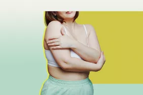 Woman Hugging Herself