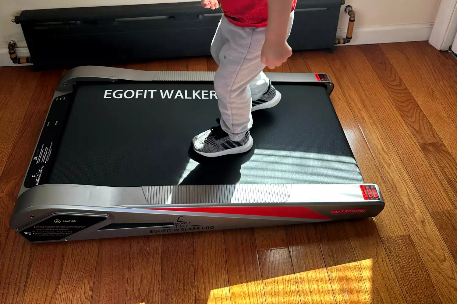 Child walking on Egofit Walker Pro-M1 Treadmill