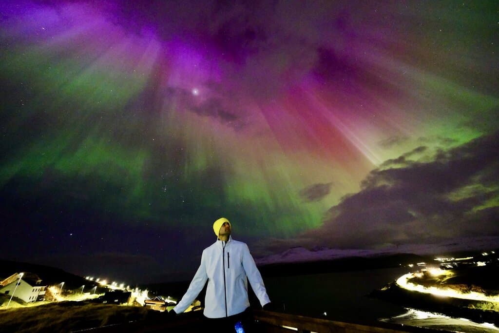 Chris Heckmann with the northern lights