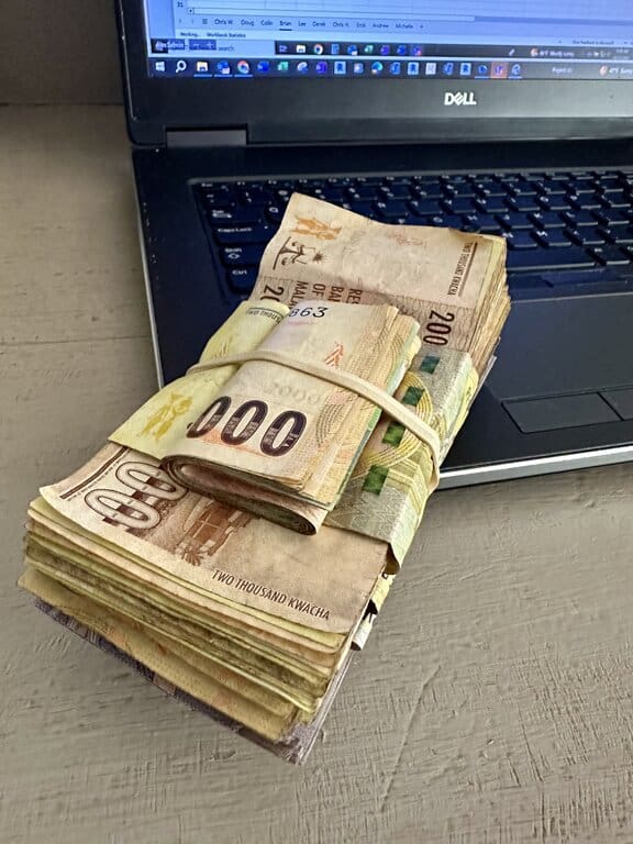 a wad of kwatcha, the Malawian currency